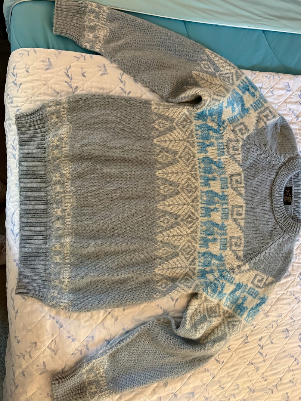 Woman’s 100% alpaca wool sweater light blue, cream color